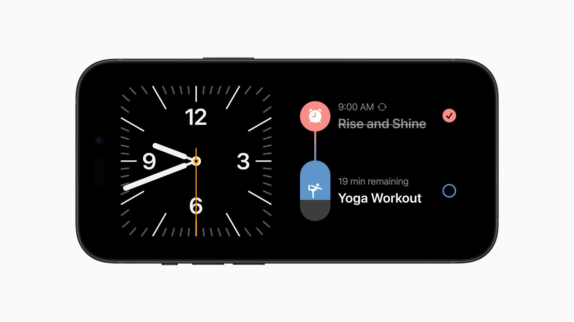 **StandBy gives users a full-screen experience with glanceable information designed to be viewed from a distance when iPhone is on its side and charging.**