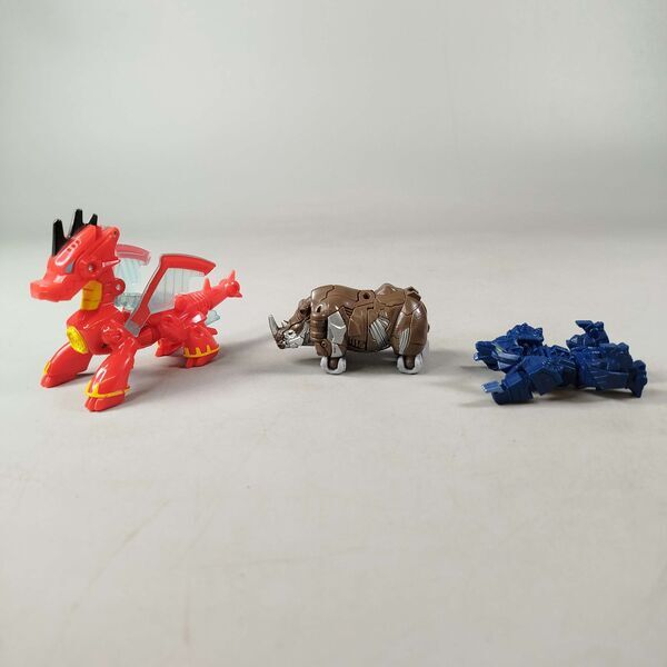 Hasbro Bundle 3x Figuren Drache Nashorn Robotere | multicolored, image 1 of 4