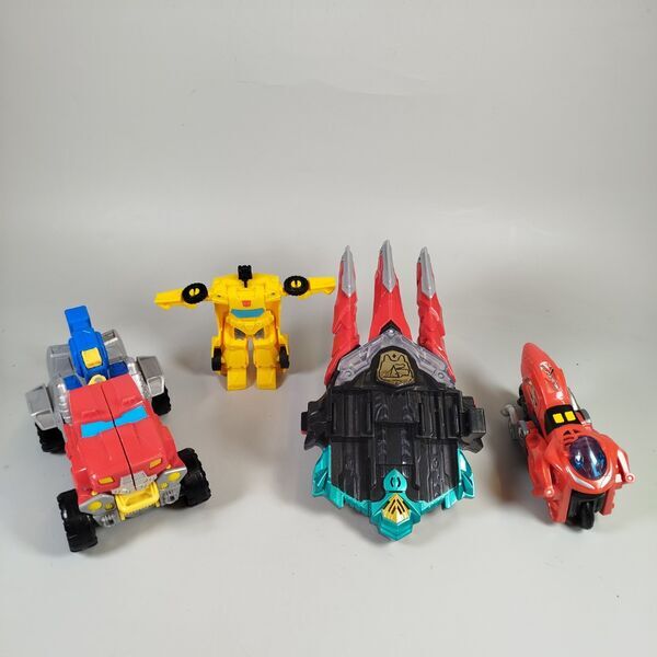 Transformers Roboter Dinosaurier - Set von 4 Transformierbare Figuren | mehrfarbig 1